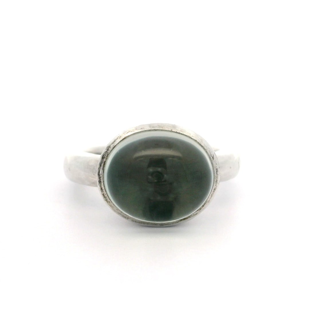 Movado Sterling Silver Green Prasiolite Cocktail Ring 7: Movado Sterling Silver Green Prasiolite Cocktail Ring 7 This exquisite Movado cocktail ring features a stunning high-profile design, showcasing a natural genuine prasiolite stone in a captivating oval