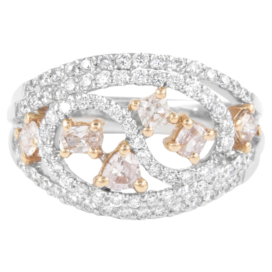 1.10ct Pink Diamond Cocktail Ring in 18k Two Tone Gold: 1.10ct Pink Diamond Cocktail Ring in 18k Two Tone Gold This exquisite modern pink diamond cocktail ring is a stunning piece of high jewelry crafted from 18k white and rose gold. Featuring a total diam