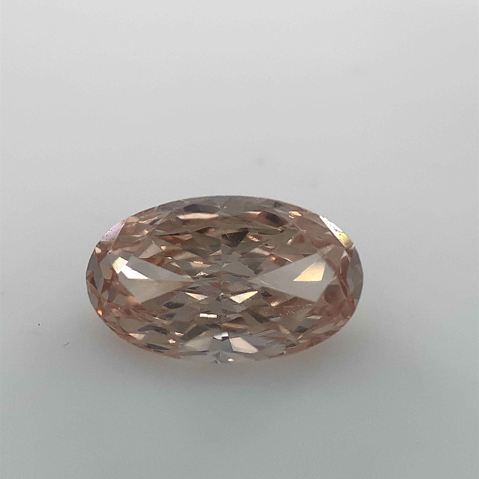 Loose Diamond - OVAL 0.8ct Fancy Yellowish Orange Brown SI2: Loose Diamond - OVAL 0.8ct Fancy Yellowish Orange Brown SI2 Source: Natural Shape: OVAL Carats: 0.8 Color: Fancy Yellowish Orange Brown Certification: GIA Video: