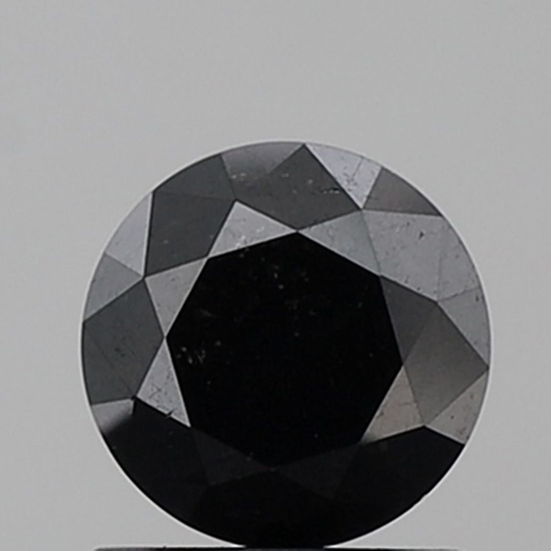 Loose Diamond - ROUND 1.27ct Fancy Black VS2: Loose Diamond - ROUND 1.27ct Fancy Black VS2 Source: Natural Shape: ROUND Carats: 1.27 Color: Fancy Black Certification: NONE Video: