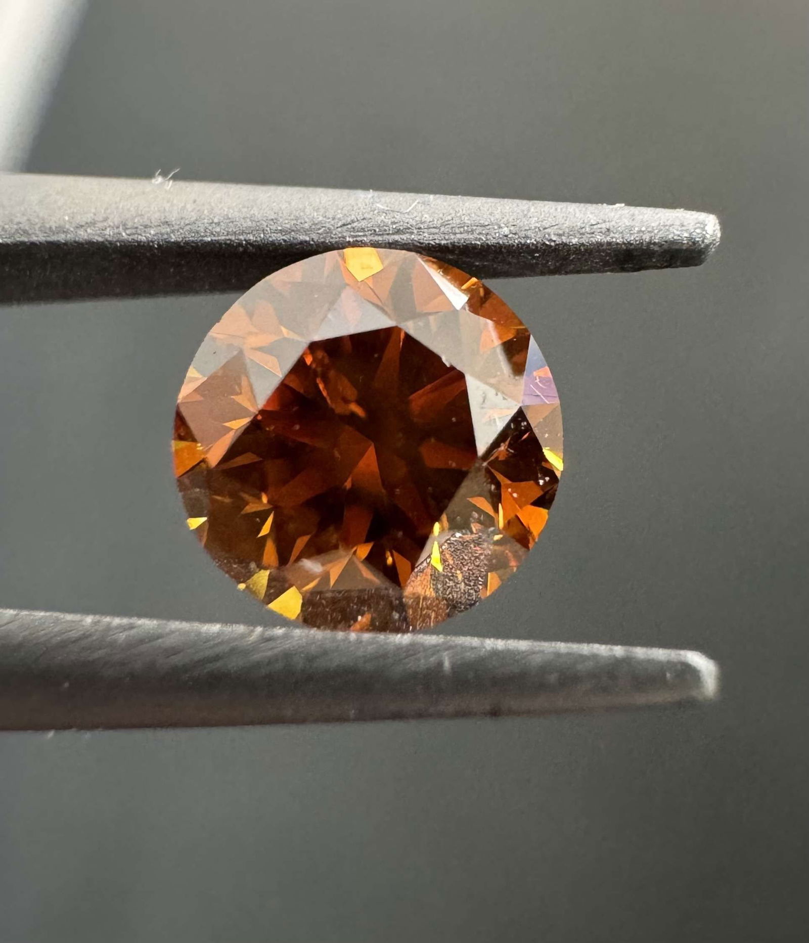 Loose Diamond - ROUND 0.52ct Fancy Deep Brownish Orange I1: Loose Diamond - ROUND 0.52ct Fancy Deep Brownish Orange I1 Source: Natural Shape: ROUND Carats: 0.52 Color: Fancy Deep Brownish Orange Certification: GIA Video: