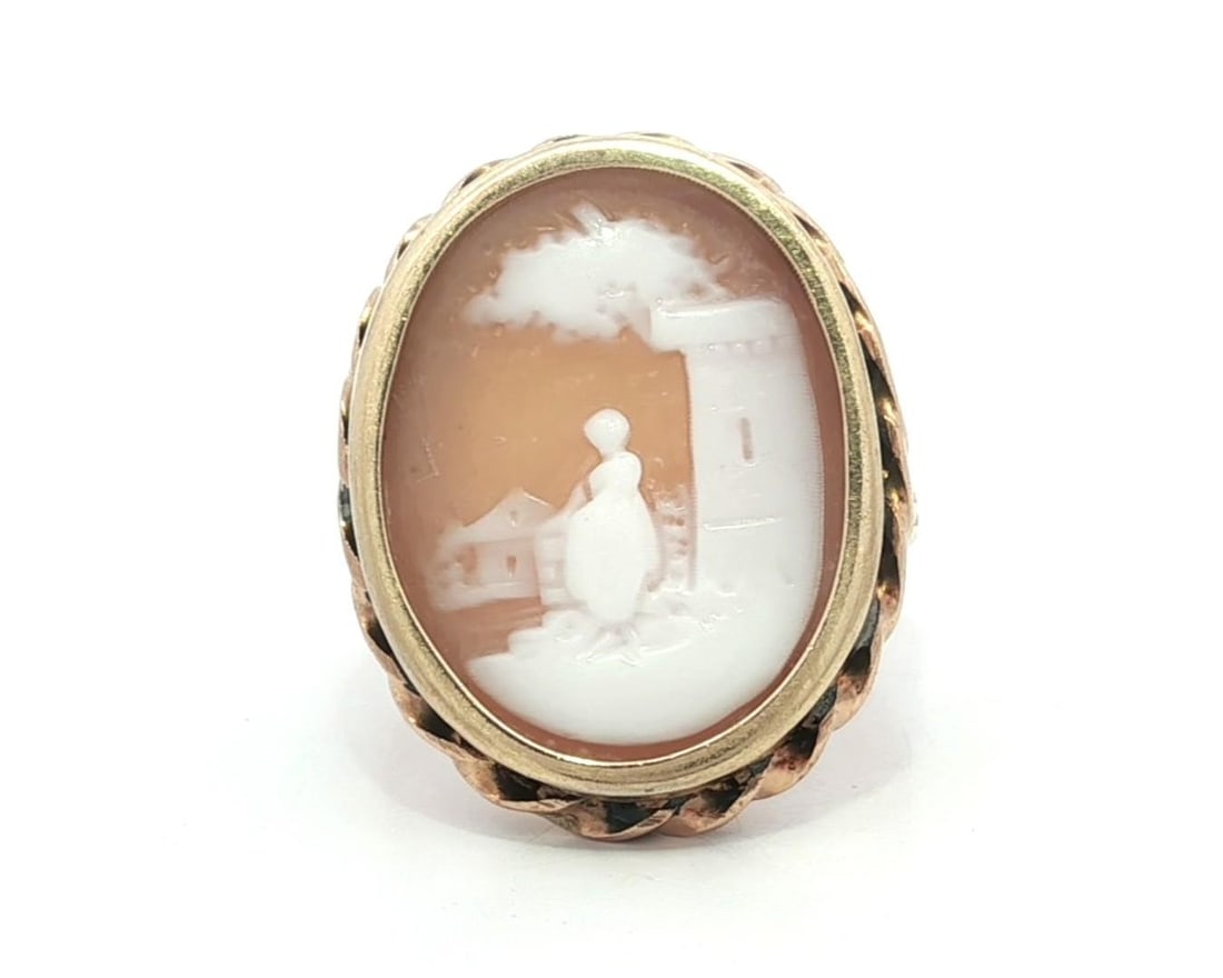 Vintage 10k Yellow Gold Twisted Wire Cameo Cocktail Ring: Vintage 10k Yellow Gold Twisted Wire Cameo Cocktail Ring This stunning vintage ring features a hand-carved cameo portrait set in solid 10k yellow gold, showcasing exquisite craftsmanship. The cameo is