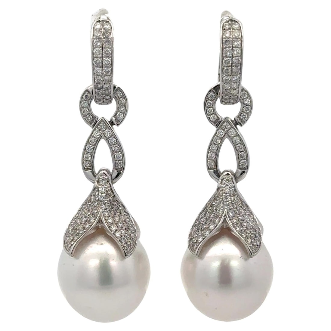 Harbor Diamonds 18K White Gold South Sea Pearl Diamond Drop Earrings 0.77ct: Harbor Diamonds 18K White Gold South Sea Pearl Diamond Drop Earrings 0.77ct These stunning drop earrings are crafted from 18 karat white gold and showcase two exquisite South Sea Pearls, each measurin