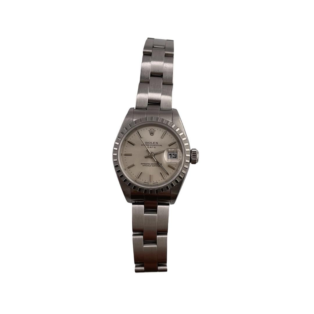 Ladies Datejust Ref 79240 Silver Dial Watch with Oyster Bracelet and Papers: Ladies Datejust Ref 79240 Silver Dial Watch with Oyster Bracelet and Papers This Rolex Datejust watch features a silver dial, engine-turned bezel, and is presented on an Oyster bracelet. It comes with