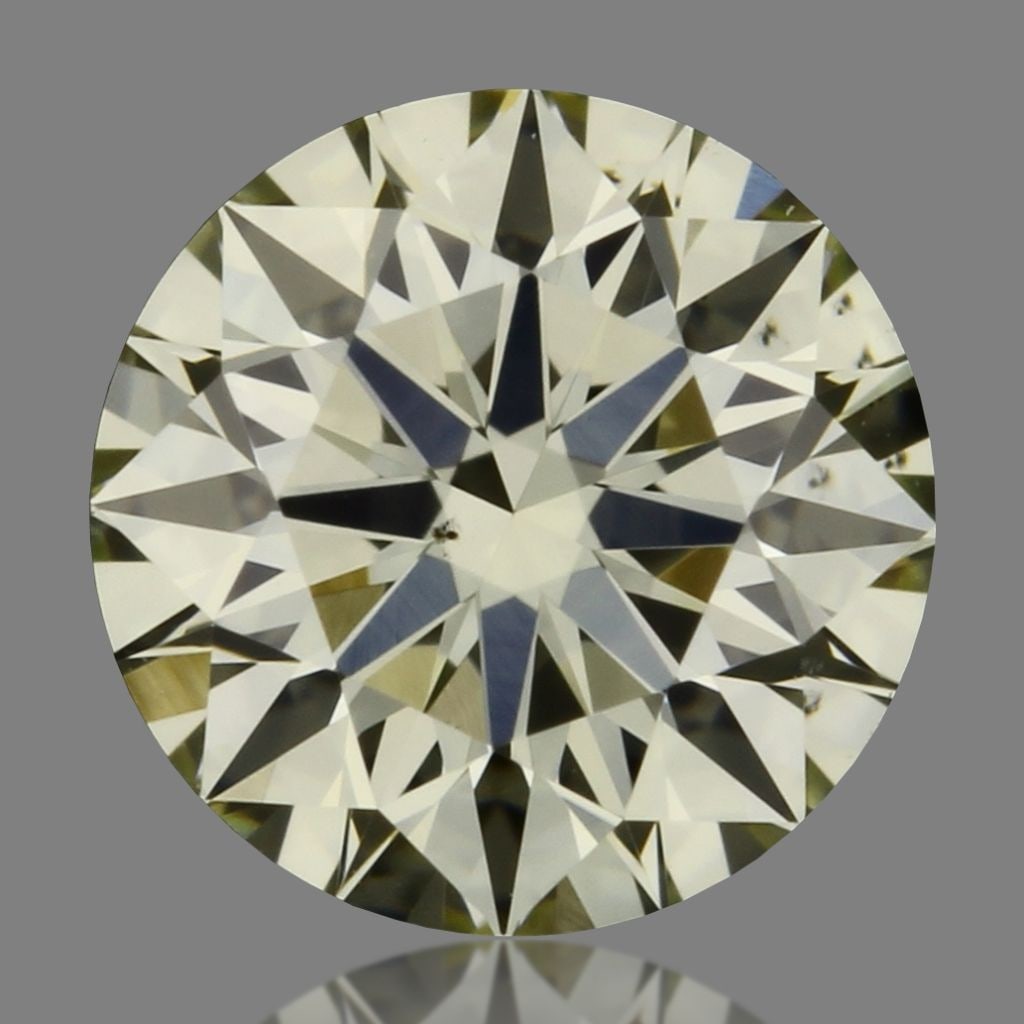 Loose Diamond - ROUND 0.31ct S-T VS2: Loose Diamond - ROUND 0.31ct S-T VS2 Source: Natural Shape: ROUND Carats: 0.31 Color: S-T Certification: IGI Video: