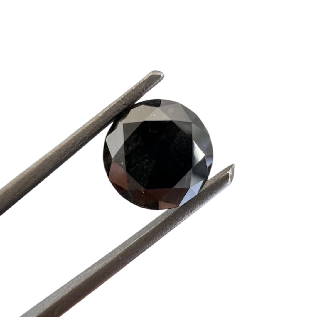 Loose Diamond - ROUND 1.39ct Fancy Black: Loose Diamond - ROUND 1.39ct Fancy Black Source: Natural Shape: ROUND Carats: 1.39 Color: Fancy Black Certification: GIA PLEASE NOTE: Framed, Large, or heavy items do not have shipping costs included.