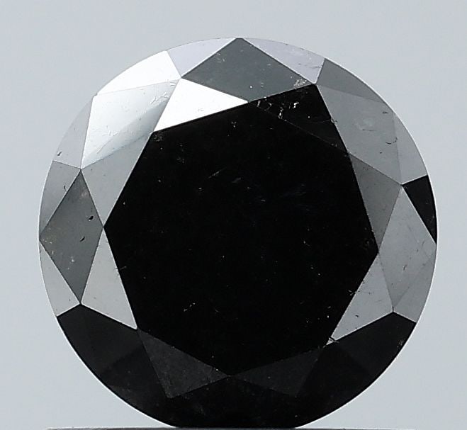Loose Diamond - ROUND 0.9ct Black VVS2: Loose Diamond - ROUND 0.9ct Black VVS2 Source: Natural Shape: ROUND Carats: 0.9 Color: Black Certification: NONE Video: