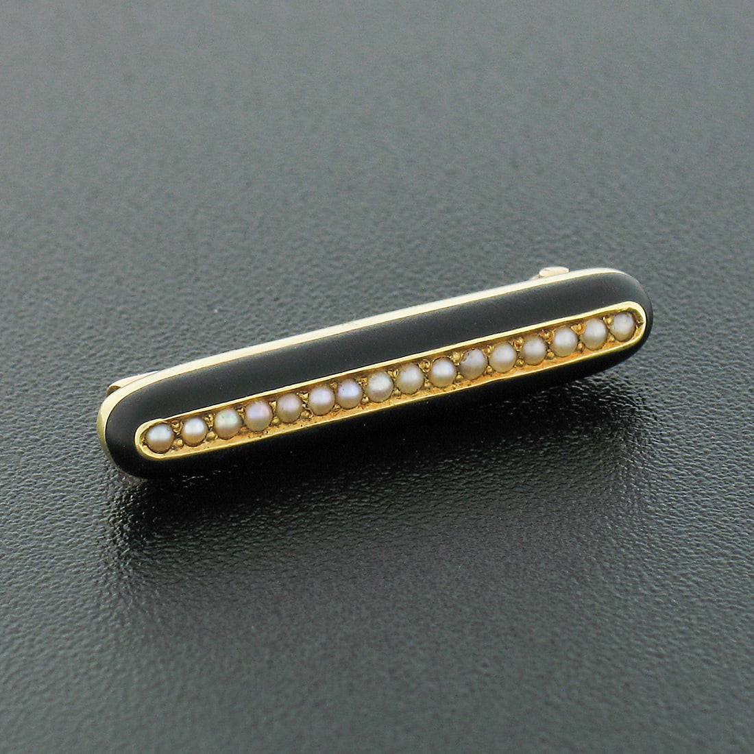 Antique 14k Yellow Gold Seed Pearl Black Enamel Bar Pin Brooch: Antique 14k Yellow Gold Seed Pearl Black Enamel Bar Pin Brooch This exquisite antique bar pin brooch is handcrafted from solid 14k yellow gold, showcasing a stunning arrangement of sixteen natural see