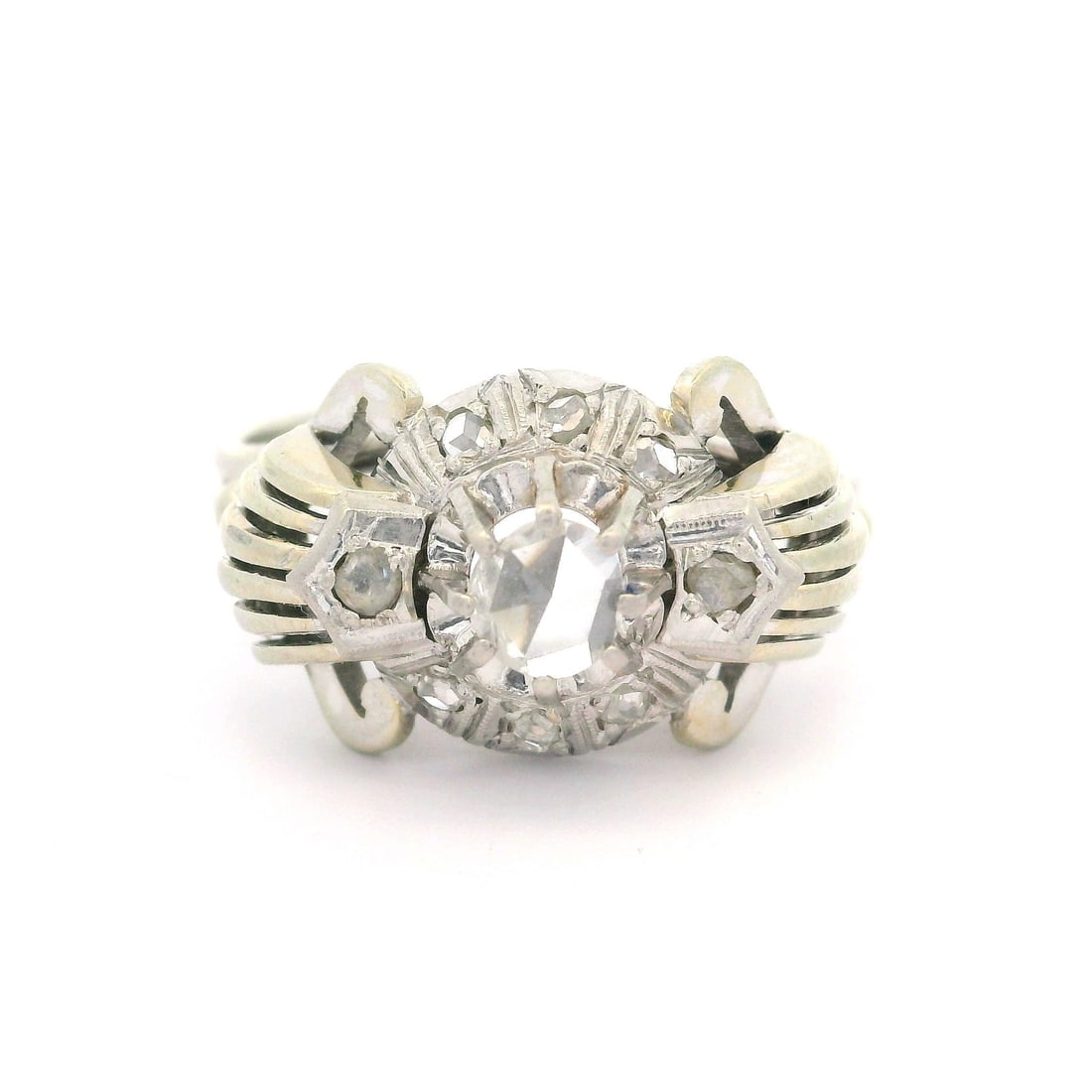 Vintage Retro 18k White Gold Rose Cut Diamond Cocktail Ring: Vintage Retro 18k White Gold Rose Cut Diamond Cocktail Ring This exquisite Vintage Retro Cocktail Ring showcases a stunning rose cut diamond set in a unique open foliage design. Crafted from solid 18k