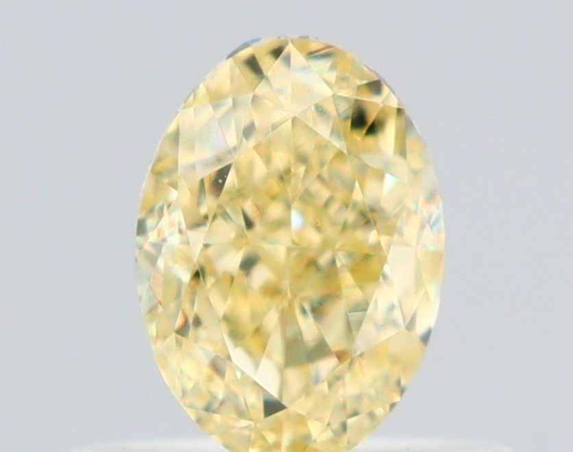 Loose Diamond - OVAL 0.57ct Fancy Yellow VVS2: Loose Diamond - OVAL 0.57ct Fancy Yellow VVS2 Source: Natural Shape: OVAL Carats: 0.57 Color: Fancy Yellow Certification: GIA Video:
