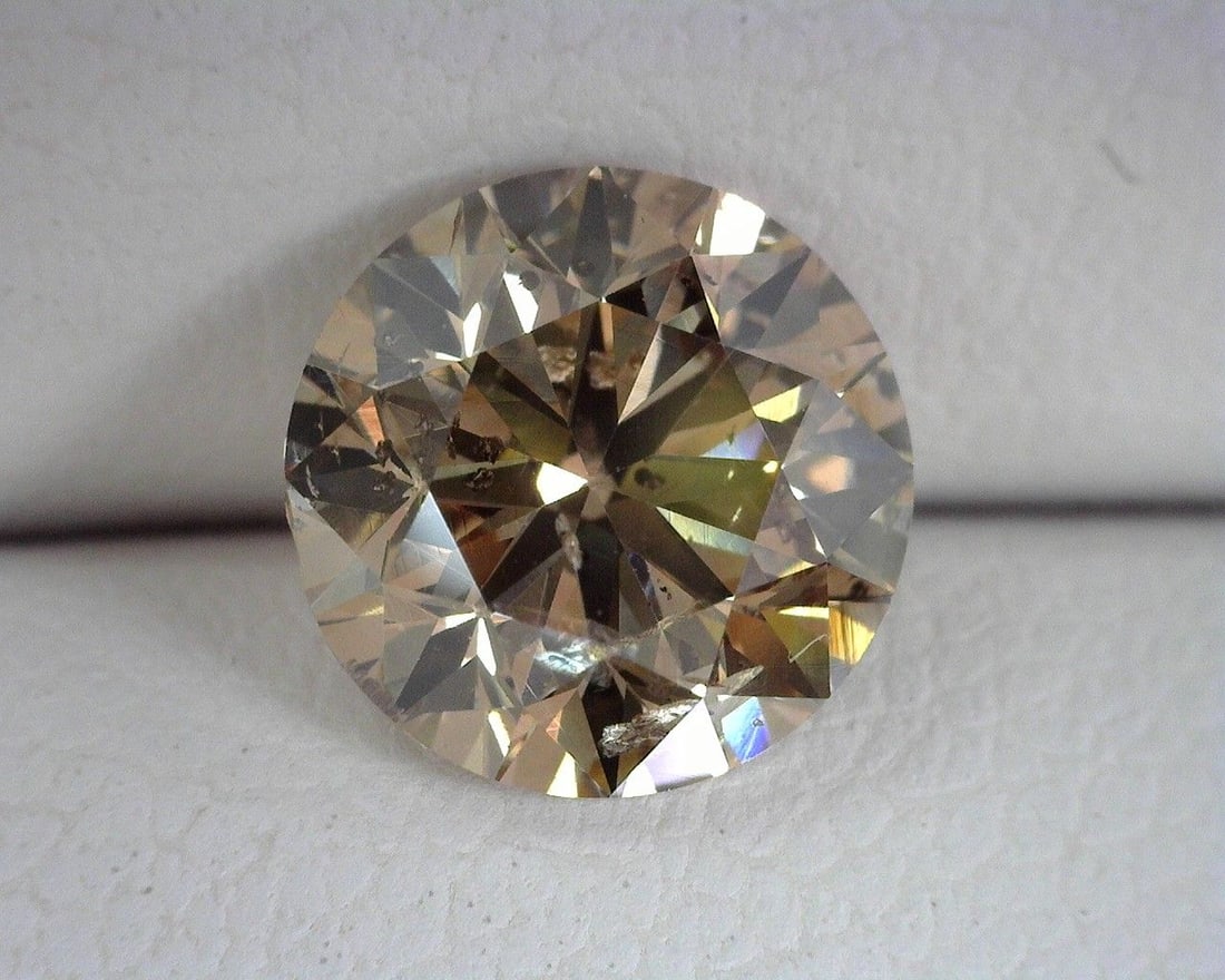 Loose Diamond - ROUND 1.51ct Brown I1: Loose Diamond - ROUND 1.51ct Brown I1 Source: Natural Shape: ROUND Carats: 1.51 Color: Brown Certification: OTHER PLEASE NOTE: Framed, Large, or heavy items do not have shipping costs included. The ex
