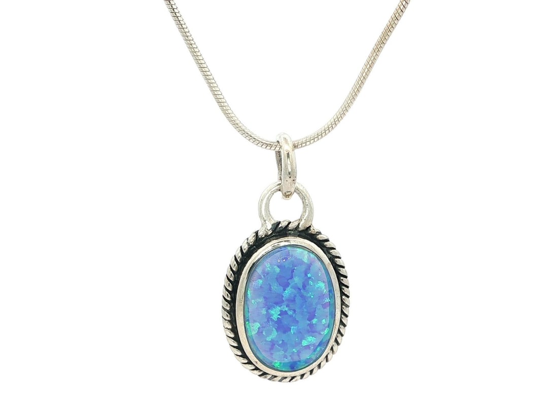 Sterling Silver Twisted Wire Necklace with Blue Boulder Opal Pendant: Sterling Silver Twisted Wire Necklace with Blue Boulder Opal Pendant This exquisite necklace features a beautiful natural boulder opal pendant, showcasing an oval cabochon shape with a stunning blue b