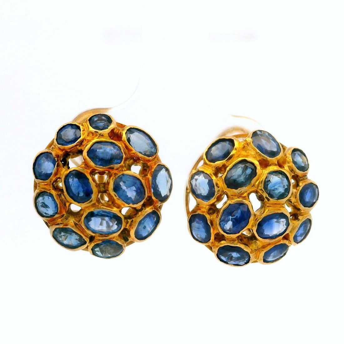 Vintage 12k Yellow Gold 6ctw Mosaic Sapphire Omega Back Earrings: Vintage 12k Yellow Gold 6ctw Mosaic Sapphire Omega Back Earrings This exquisite pair of vintage earrings features a stunning mosaic design with a combination of oval and round cut genuine sapphires, t