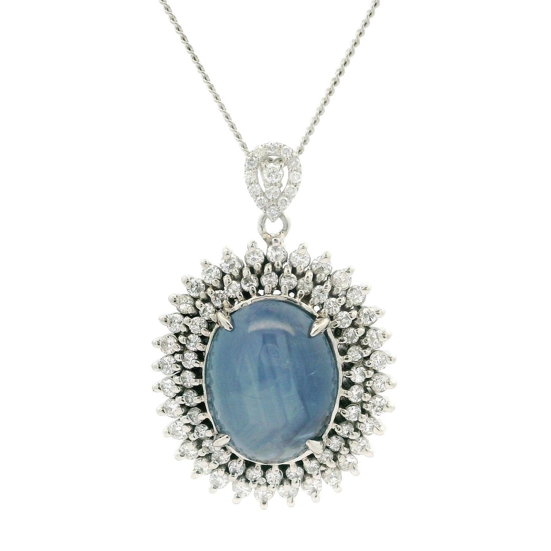 Platinum 14.63ct Blue Sapphire Diamond Double Halo Pendant Necklace: Platinum 14.63ct Blue Sapphire Diamond Double Halo Pendant Necklace This exquisite necklace features a stunning 14.63ct natural blue star sapphire, elegantly set in a double halo of brilliant white di