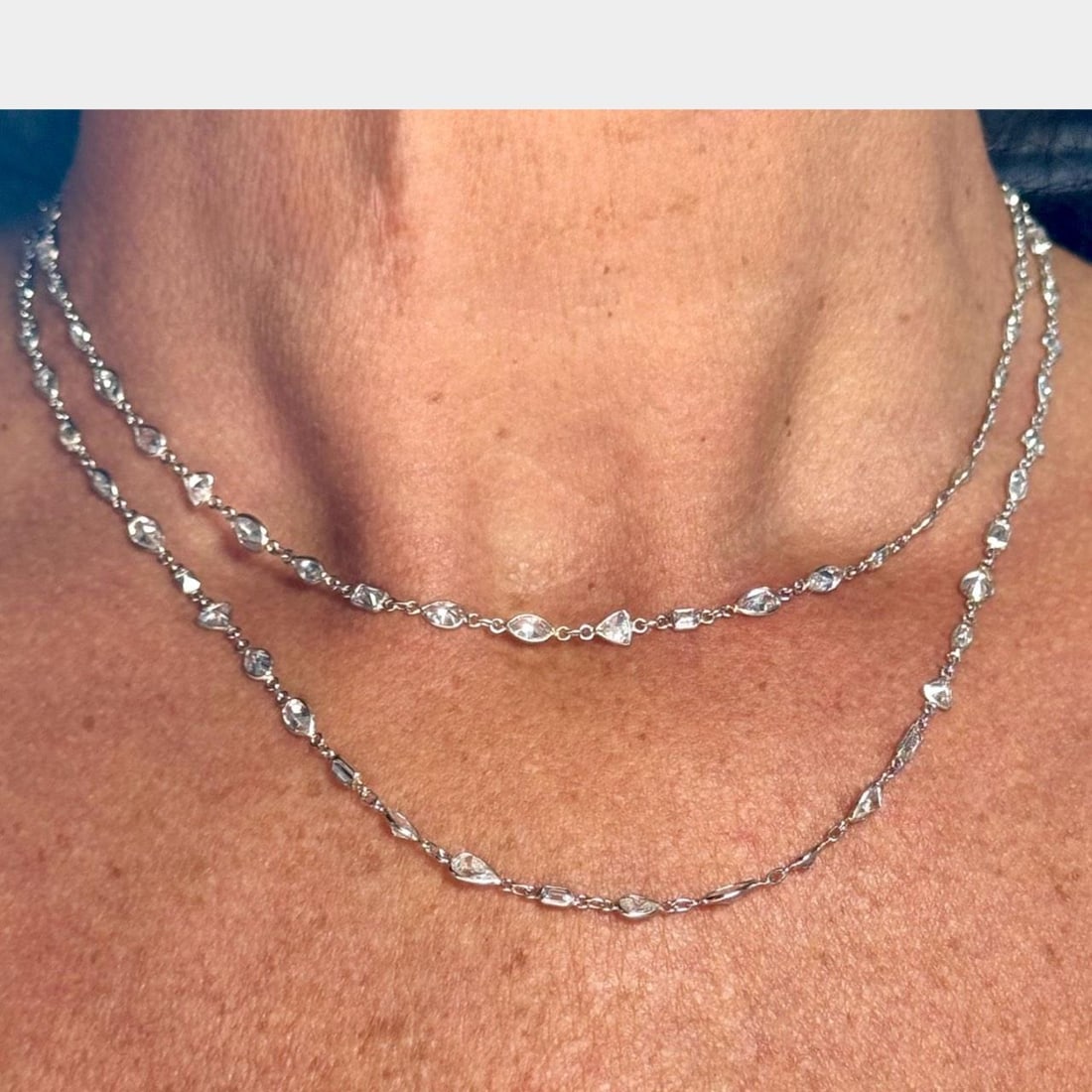 Platinum 32 Inch 18.40 Ct Diamond by the Yard Necklace: Platinum 32 Inch 18.40 Ct Diamond by the Yard Necklace This exquisite Platinum Diamond by the Yard Necklace features a stunning arrangement of 89 fancy-shape diamonds, totaling approximately 18.40 car
