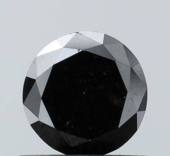 Loose Diamond - ROUND 0.82ct Fancy Black VS1: Loose Diamond - ROUND 0.82ct Fancy Black VS1 Source: Natural Shape: ROUND Carats: 0.82 Color: Fancy Black Certification: NONE Video: