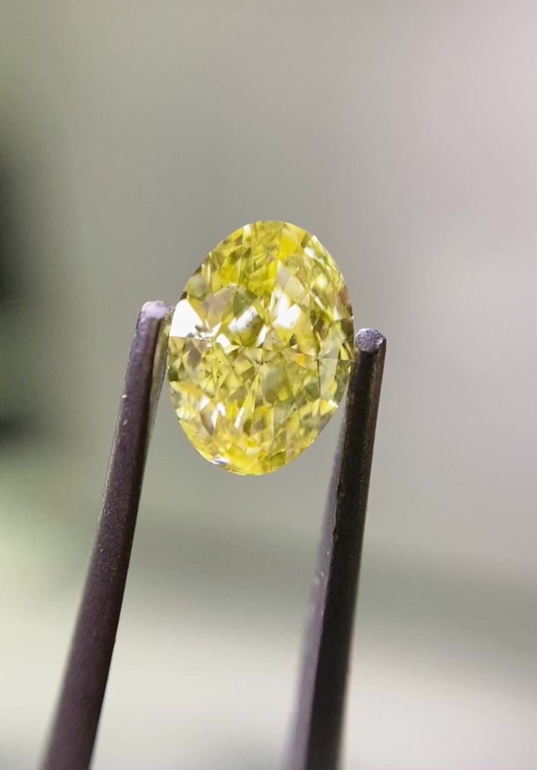 Loose Diamond - OVAL 0.62ct Fancy Intense Yellow SI2: Loose Diamond - OVAL 0.62ct Fancy Intense Yellow SI2 Source: Natural Shape: OVAL Carats: 0.62 Color: Fancy Intense Yellow Certification: GIA Video: