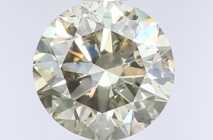Loose Diamond - ROUND 0.69ct Fancy Yellow Brown: Loose Diamond - ROUND 0.69ct Fancy Yellow Brown Source: Natural Shape: ROUND Carats: 0.69 Color: Fancy Yellow Brown Certification: GIA Video: