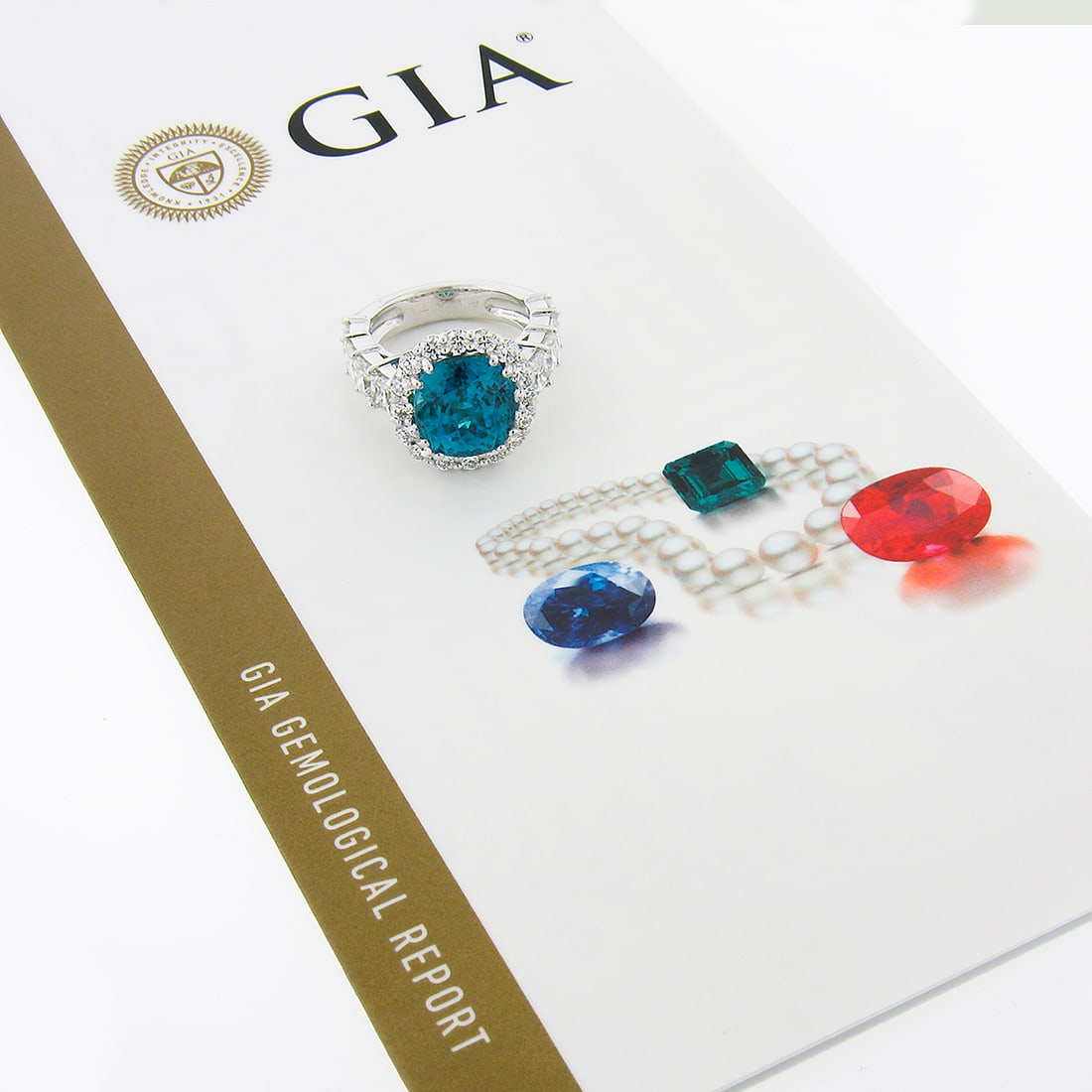 Platinum GIA 16.53ctw Blue Zircon & Diamond Cocktail Ring: Platinum GIA 16.53ctw Blue Zircon & Diamond Cocktail Ring This exquisite cocktail ring features a stunning 16.53 carat total weight, showcasing a large cushion-cut natural genuine zircon at its center