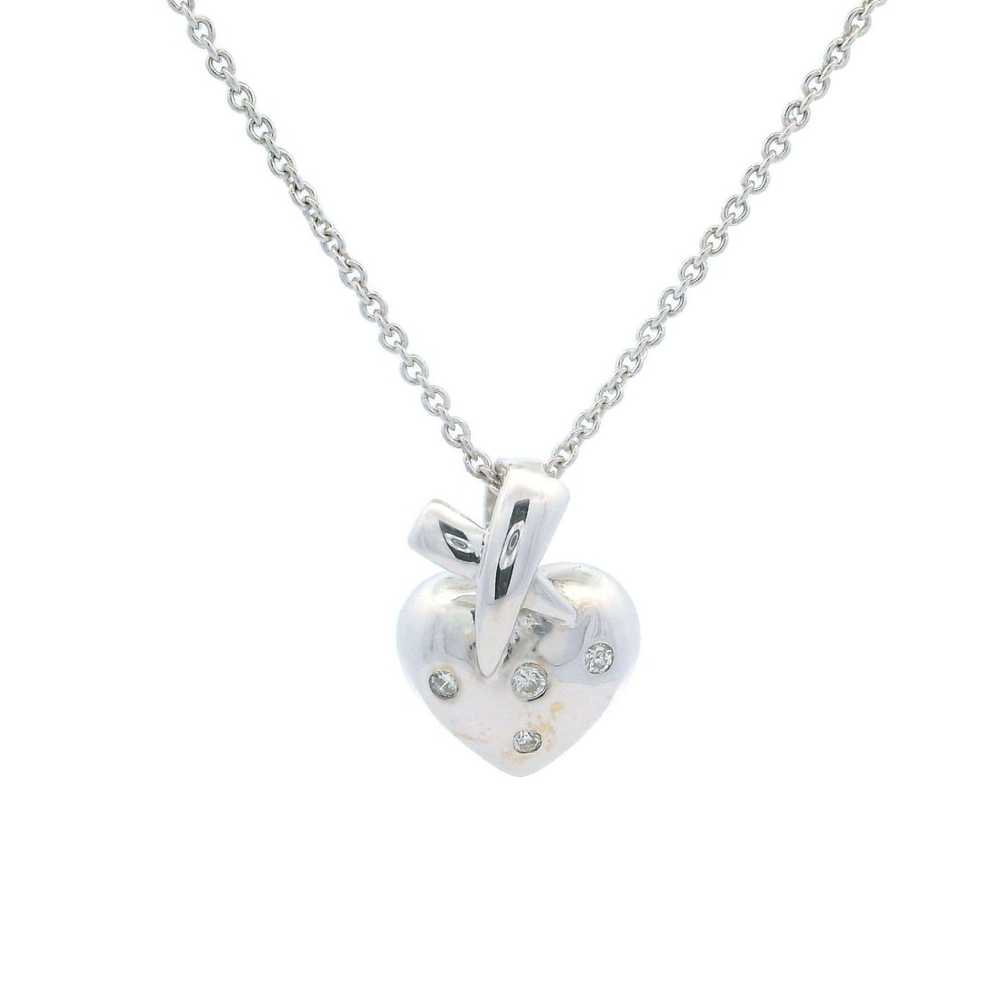 14k White Gold Diamond Heart Slide Pendant Necklace 0.02ctw: 14k White Gold Diamond Heart Slide Pendant Necklace 0.02ctw This exquisite 14k white gold pendant necklace features a petite polished heart design, elegantly enhanced by four natural genuine diamonds.