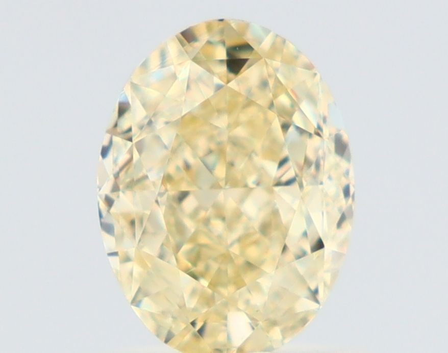 Loose Diamond - OVAL 1.06ct Fancy Light Yellow VS2: Loose Diamond - OVAL 1.06ct Fancy Light Yellow VS2 Source: Natural Shape: OVAL Carats: 1.06 Color: Fancy Light Yellow Certification: GIA Video:
