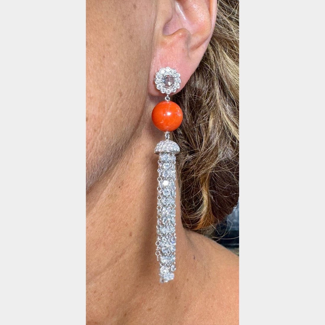 Stunning 18K White Gold Coral Diamond Chandelier Earrings 3": Stunning 18K White Gold Coral Diamond Chandelier Earrings 3" Elevate your elegance with these stunning 18K White Gold Coral & Diamond Chandelier Earrings. Weighing 19.4 grams, these exquisite earrings