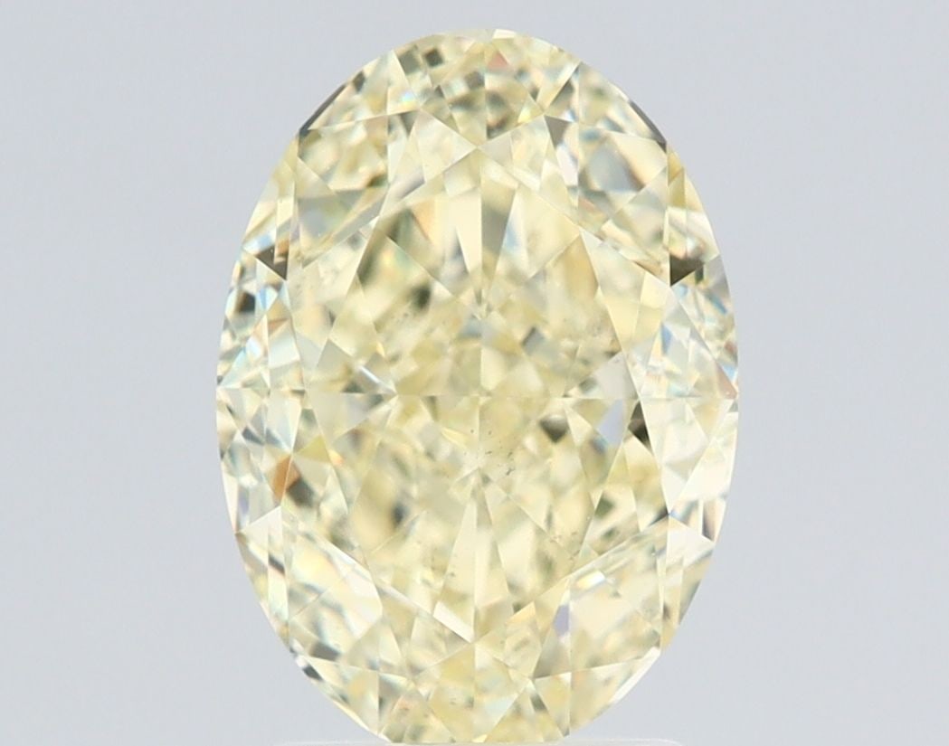 Loose Diamond - OVAL 2.72ct Fancy Light Yellow VS2: Loose Diamond - OVAL 2.72ct Fancy Light Yellow VS2 Source: Natural Shape: OVAL Carats: 2.72 Color: Fancy Light Yellow Certification: GIA Video: