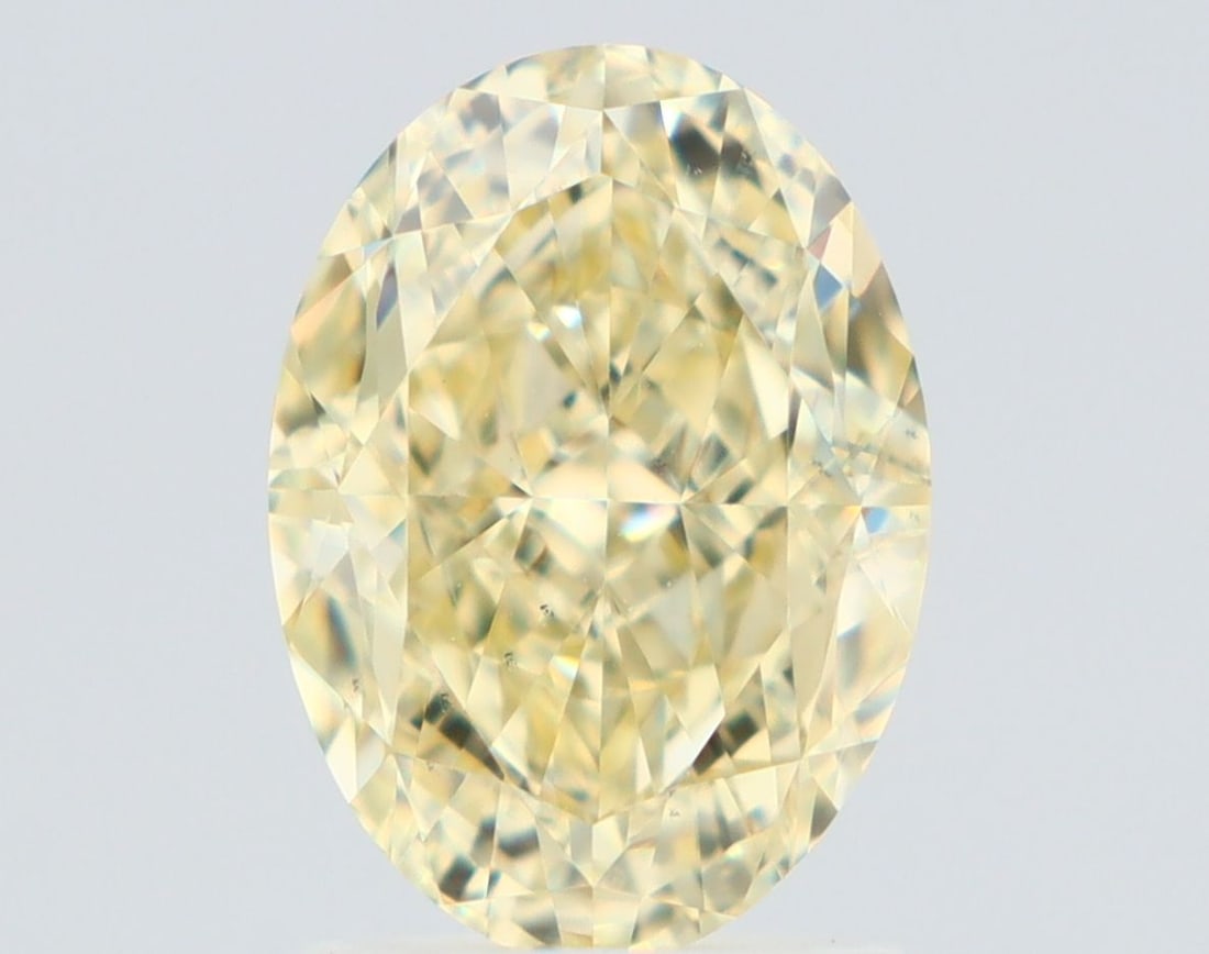 Loose Diamond - OVAL 2.15ct Fancy Light Yellow VS2: Loose Diamond - OVAL 2.15ct Fancy Light Yellow VS2 Source: Natural Shape: OVAL Carats: 2.15 Color: Fancy Light Yellow Certification: GIA Video: