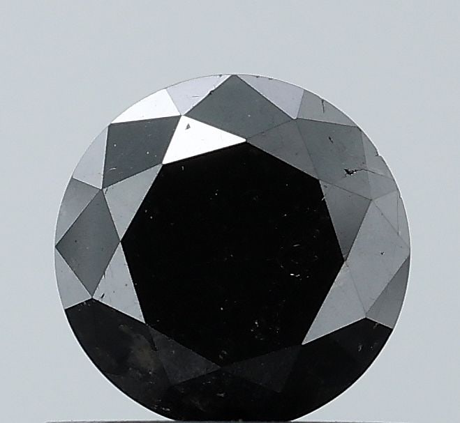 Loose Diamond - ROUND 0.72ct Fancy Black VS1: Loose Diamond - ROUND 0.72ct Fancy Black VS1 Source: Natural Shape: ROUND Carats: 0.72 Color: Fancy Black Certification: NONE Video:
