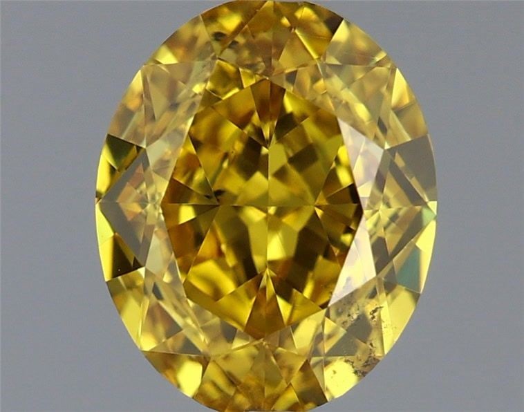 Loose Diamond - OVAL 0.78ct Fancy Vivid Yellow SI1: Loose Diamond - OVAL 0.78ct Fancy Vivid Yellow SI1 Source: Natural Shape: OVAL Carats: 0.78 Color: Fancy Vivid Yellow Certification: GIA Video: