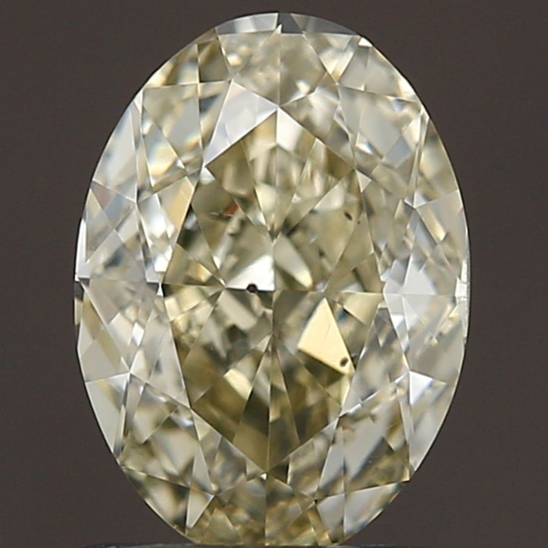 Loose Diamond - OVAL 1.21ct Fancy Brownish Greenish Yellow SI1: Loose Diamond - OVAL 1.21ct Fancy Brownish Greenish Yellow SI1 Source: Natural Shape: OVAL Carats: 1.21 Color: Fancy Brownish Greenish Yellow Certification: GIA Video: