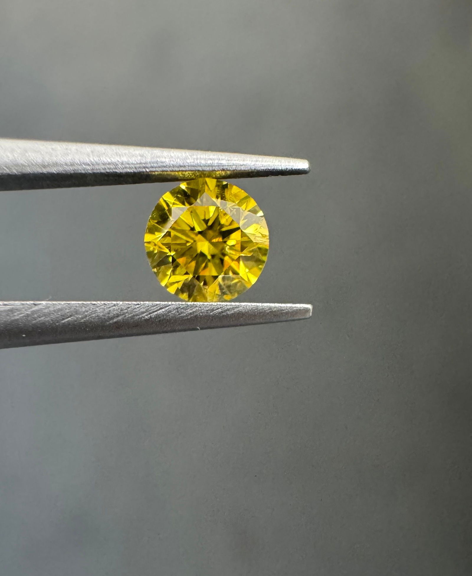 Loose Diamond - ROUND 0.22ct Fancy Vivid Yellow I1: Loose Diamond - ROUND 0.22ct Fancy Vivid Yellow I1 Source: Natural Shape: ROUND Carats: 0.22 Color: Fancy Vivid Yellow Certification: GIA PLEASE NOTE: Framed, Large, or heavy items do not have shippin