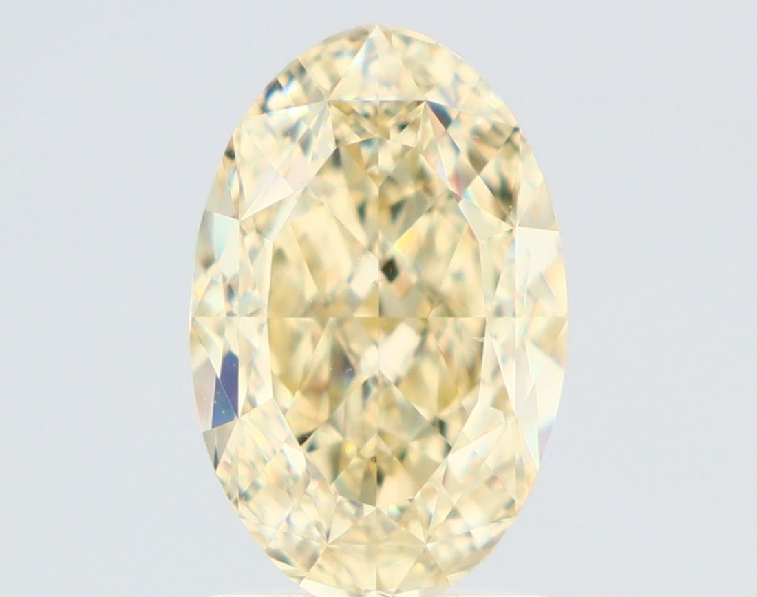 Loose Diamond - OVAL 2.01ct Fancy Light Yellow VS2: Loose Diamond - OVAL 2.01ct Fancy Light Yellow VS2 Source: Natural Shape: OVAL Carats: 2.01 Color: Fancy Light Yellow Certification: GIA Video: