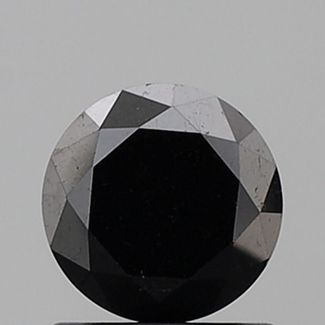 Loose Diamond - ROUND 1.23ct Fancy Black VS1: Loose Diamond - ROUND 1.23ct Fancy Black VS1 Source: Natural Shape: ROUND Carats: 1.23 Color: Fancy Black Certification: NONE Video: