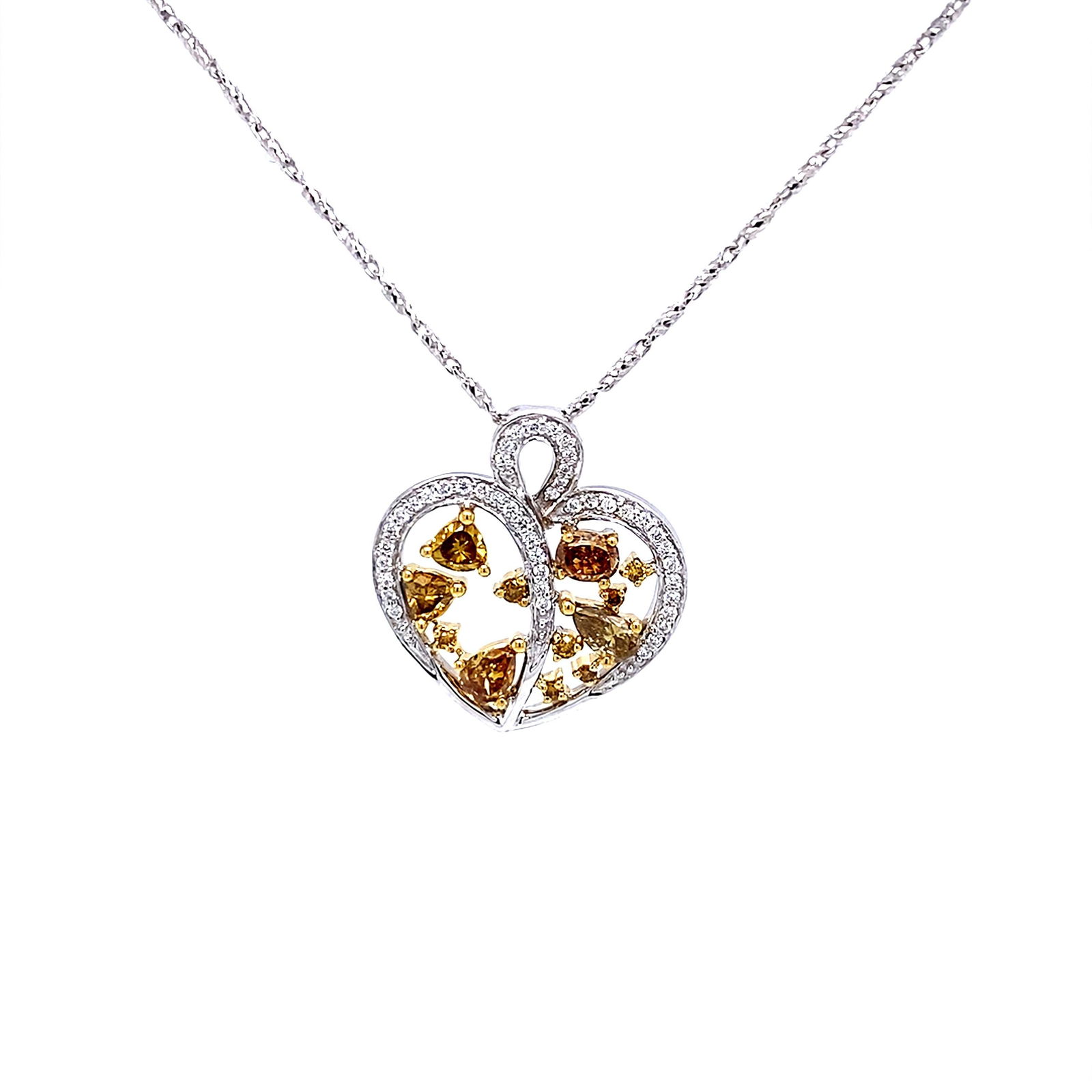 1.16ct Heart Pendant Necklace 18k Yellow Gold Brown White Diamonds: 1.16ct Heart Pendant Necklace 18k Yellow Gold Brown White Diamonds This exquisite heart-shaped pendant necklace features a stunning combination of yellowish brown and white diamonds, showcasing a cont