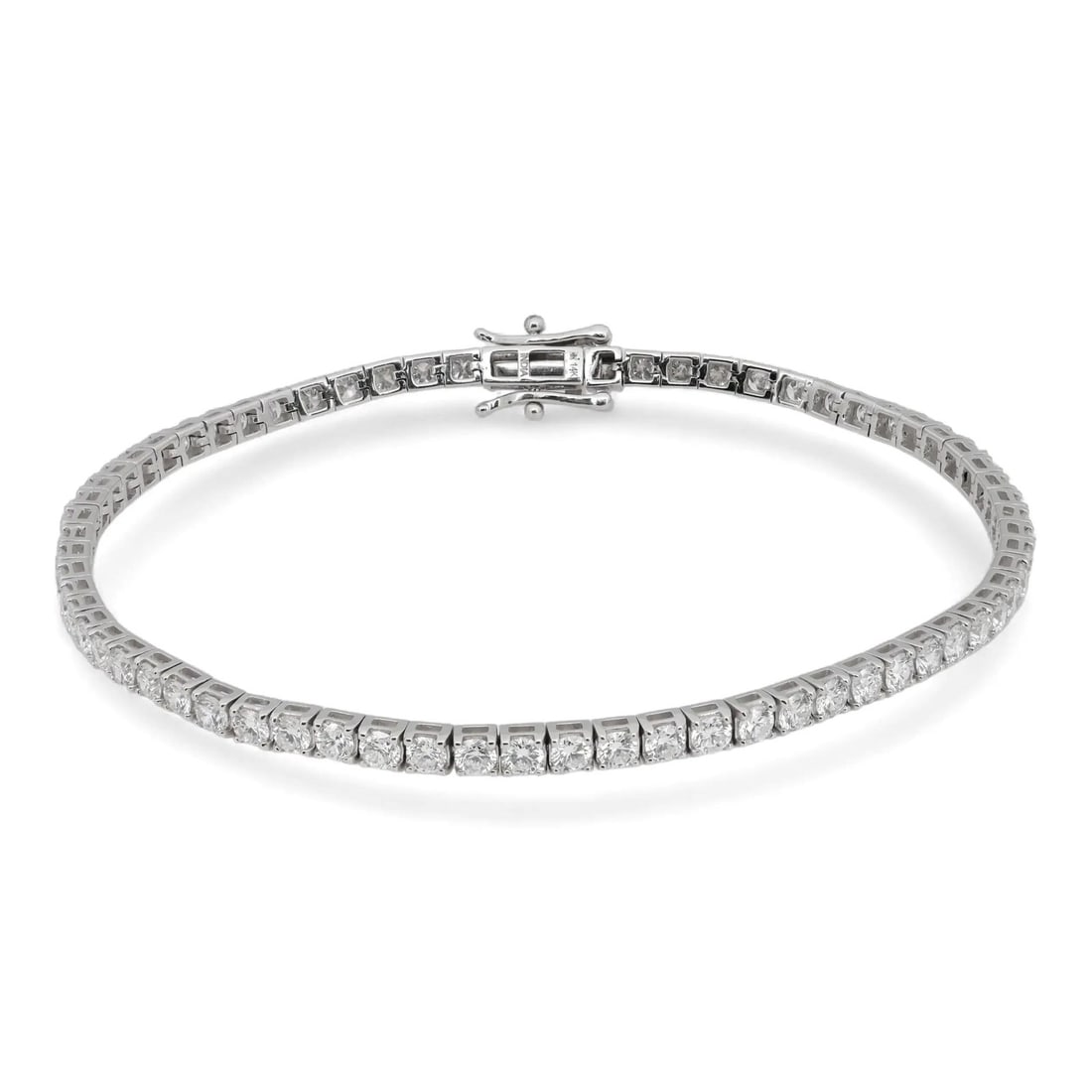 5.00 Carat Lab Diamond Tennis Bracelet in 14K White Gold: 5.00 Carat Lab Diamond Tennis Bracelet in 14K White Gold This elegant tennis bracelet showcases 68 round brilliant cut lab grown diamonds set in a prong style. Crafted from 14k white gold, the bracele