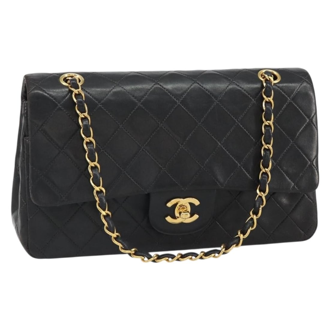 Chanel Matelasse 25 Black Lambskin Double Flap Shoulder Bag with Gold Chain: Chanel Matelasse 25 Black Lambskin Double Flap Shoulder Bag with Gold Chain This CHANEL Matelasse 25 Double Flap Chain Bag is crafted from black lambskin leather with gold-tone accents and features th
