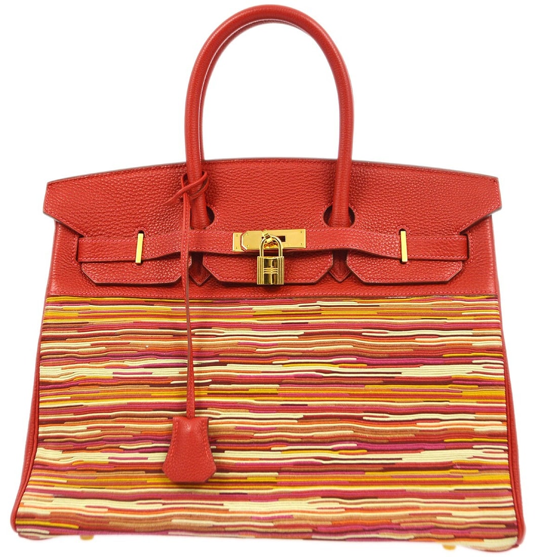 Red Vibrato Leather Birkin 35 Satchel by Hermes with Double Handles: Red Vibrato Leather Birkin 35 Satchel by Hermes with Double Handles This Hermes Birkin 35 handbag is crafted from red Box calf Vibrato leather and features a large, structured silhouette with double h