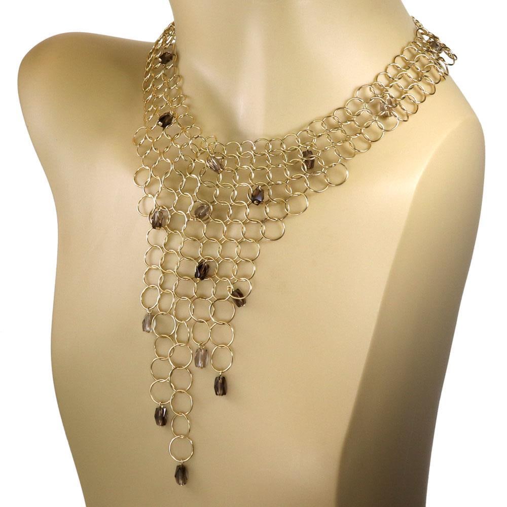 Gucci 18k Yellow Gold Smoky Quartz Bib Necklace: Gucci 18k Yellow Gold Smoky Quartz Bib Necklace Elevate your jewelry collection with this stunning Gucci bib necklace, expertly crafted from luxurious 18k yellow gold with a polished finish. This fash