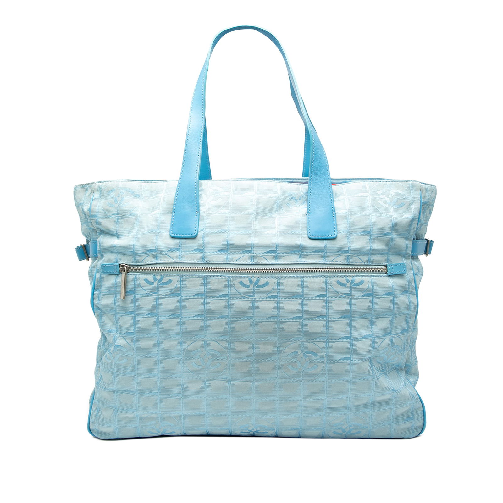 Chanel New Travel Line Blue Nylon Tote Bag: Chanel New Travel Line Blue Nylon Tote Bag Introducing the Chanel New Travel Line Nylon Tote, a stylish and functional accessory perfect for everyday use. This tote features a durable nylon body compl
