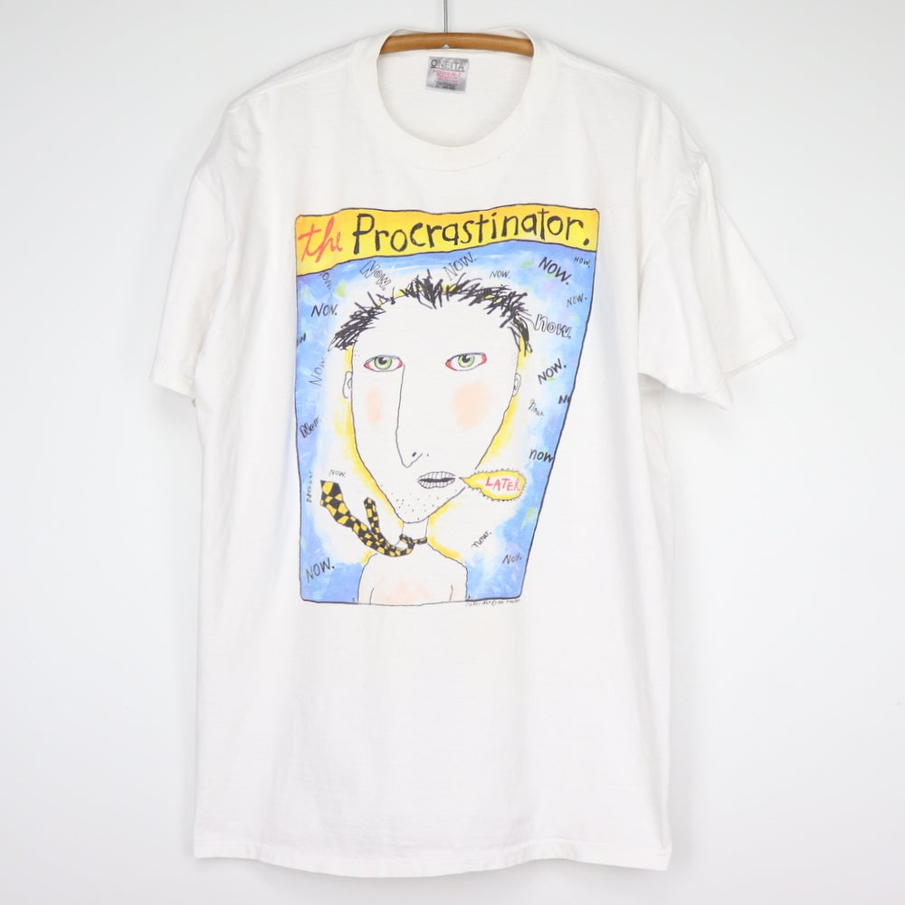 1991 Vintage Fred Babb Procrastinator Shirt 100% Cotton White: 1991 Vintage Fred Babb Procrastinator Shirt 100% Cotton White Discover a piece of history with this authentic vintage 1991 The Procrastinator Fred Babb Shirt. Crafted from 100% cotton, this shirt feat