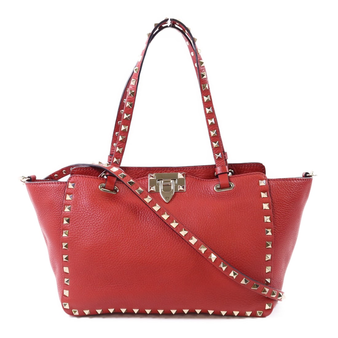 Valentino Rockstud 2 Way Shoulder Bag Red Calfskin Leather: Valentino Rockstud 2 Way Shoulder Bag Red Calfskin Leather Introducing the Valentino GHW Rockstud 2 Way Shoulder Bag, a stylish accessory crafted from premium calfskin leather in a vibrant red hue. Th