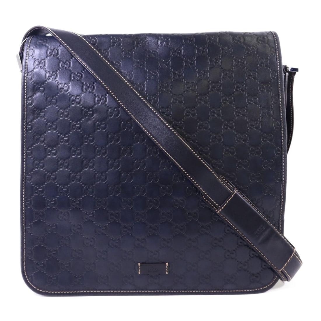Gucci GG Navy Calfskin Leather Messenger Shoulder Bag Silver Hardware 145840: Gucci GG Navy Calfskin Leather Messenger Shoulder Bag Silver Hardware 145840 This Gucci messenger bag features a navy calfskin leather exterior and is designed as a shoulder bag. Made in Italy, it off