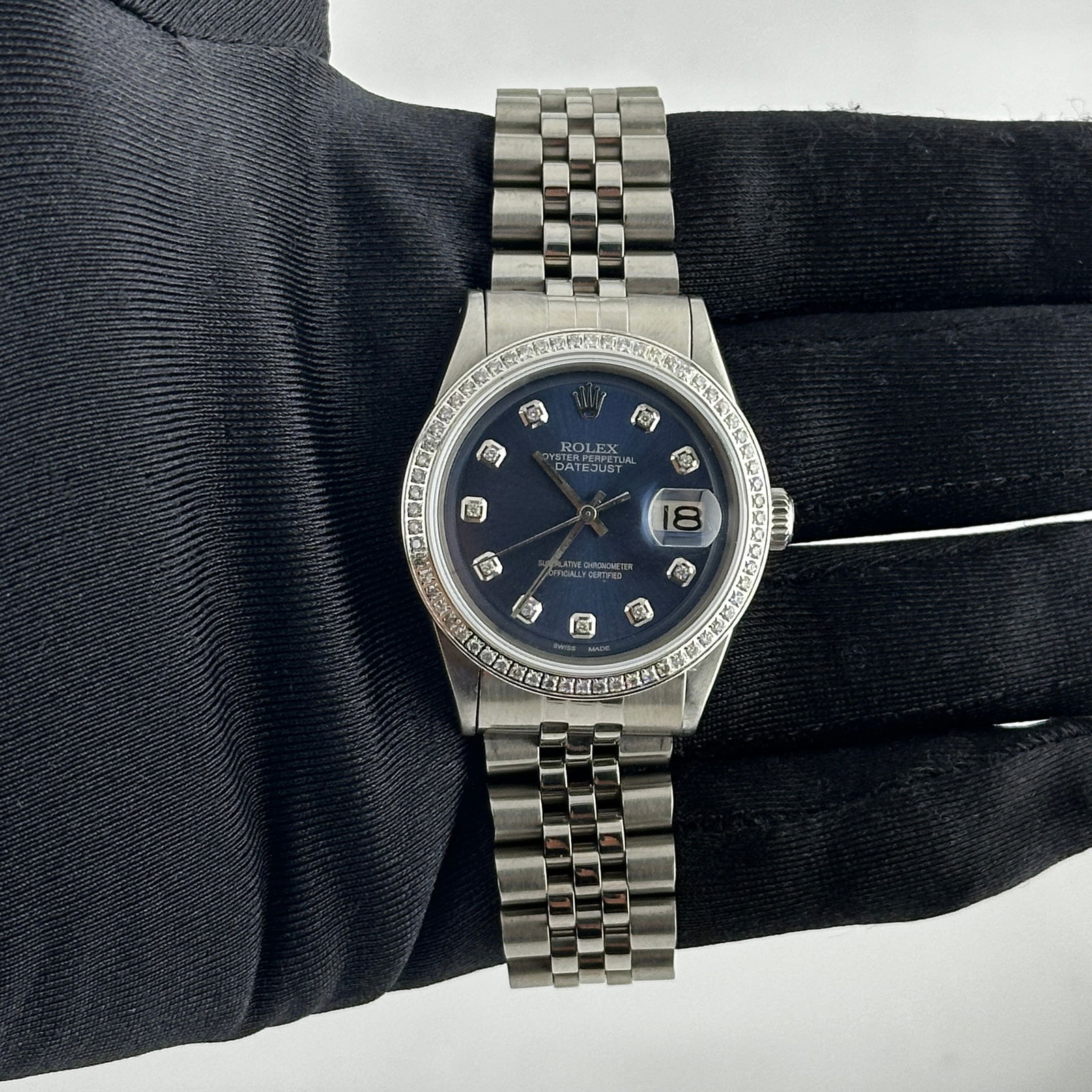 Datejust Ref 1601 Men's Watch with Aftermarket Blue Diamond Dial and Jubilee Bracelet: Datejust Ref 1601 Men's Watch with Aftermarket Blue Diamond Dial and Jubilee Bracelet This is a men's Rolex Datejust watch featuring an aftermarket blue diamond dial and an aftermarket Jubilee bracele