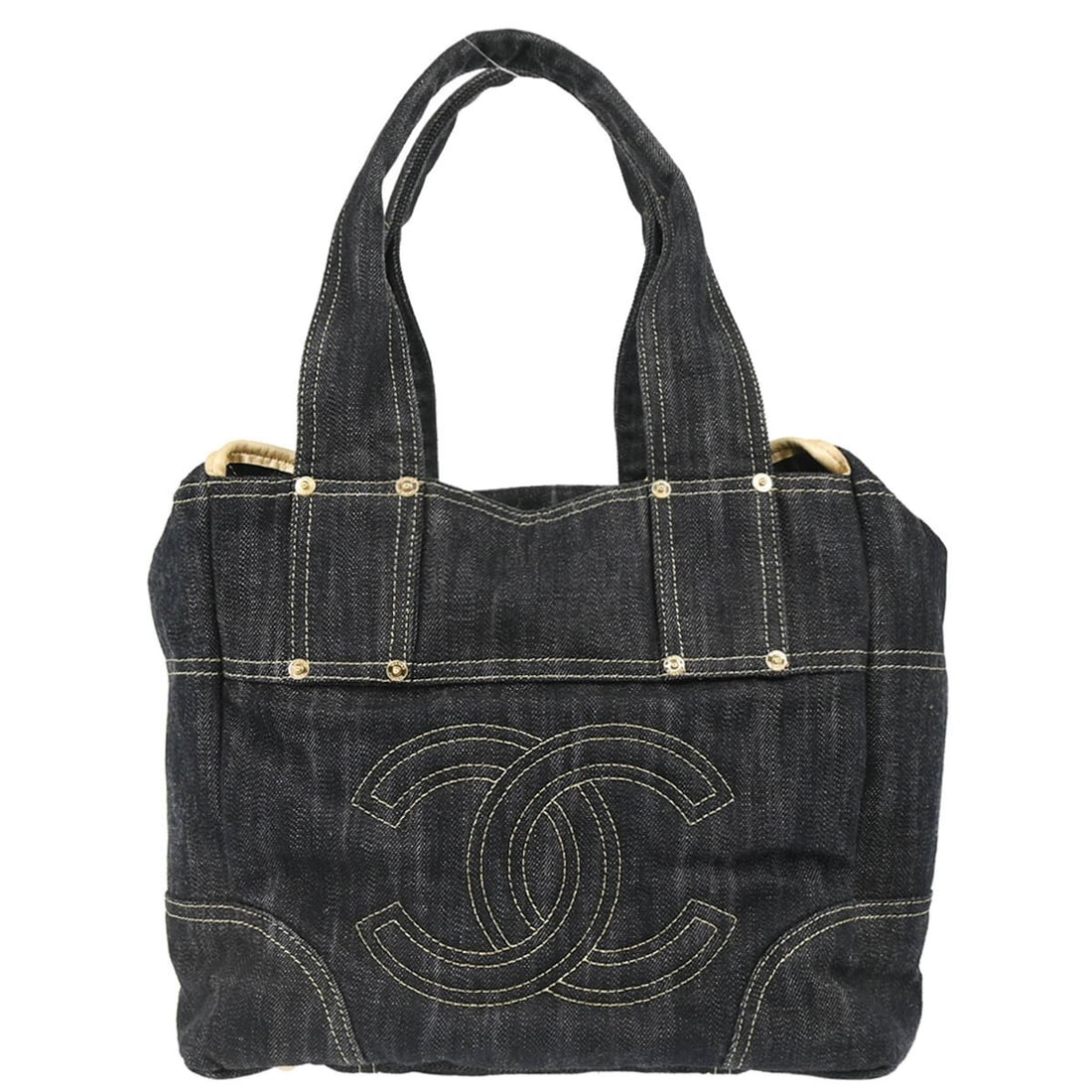 Chanel Sparkling Denim Tote Handbag Navy Blue Double Handle: Chanel Sparkling Denim Tote Handbag Navy Blue Double Handle Elevate your accessory collection with this stunning Chanel Navy Sparkling Denim Tote Handbag. This large tote features a chic button closur