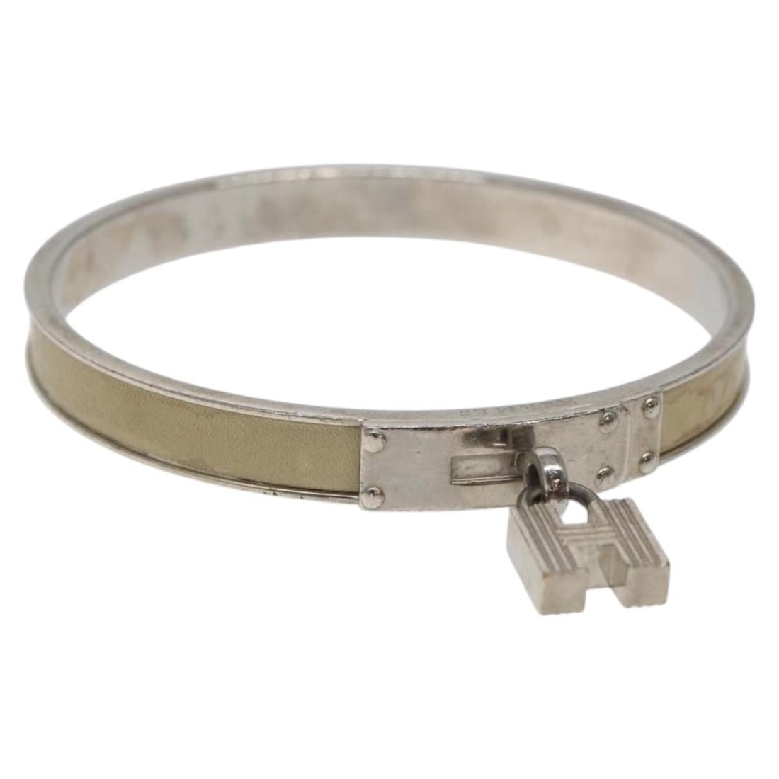 Authentic HERMES Beige Silver Metal Bracelet Made in France: Authentic HERMES Beige Silver Metal Bracelet Made in France This elegant HERMES bracelet features a sophisticated combination of beige and silver tones, crafted from durable metal. Manufactured in Fra