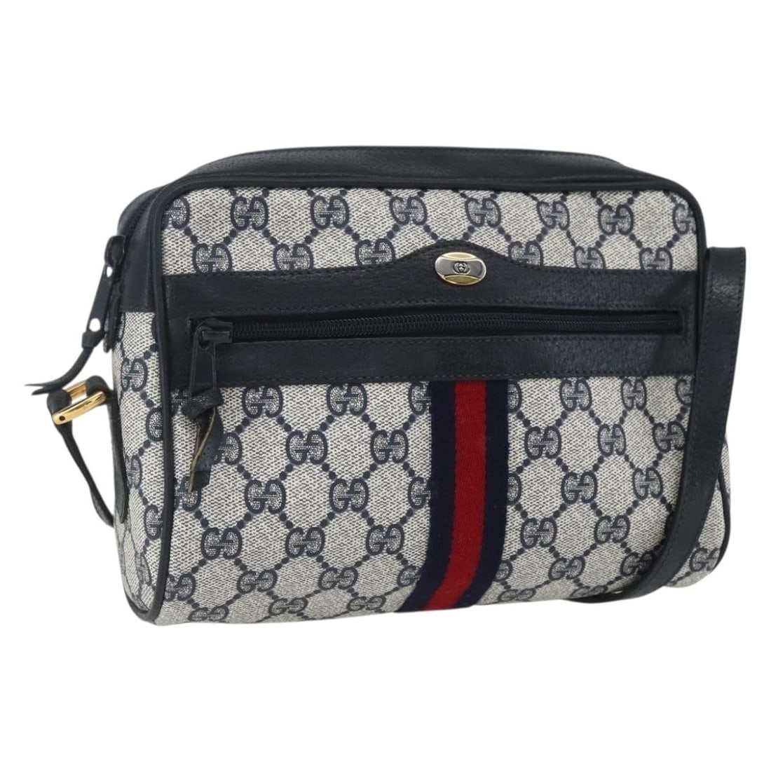 Gucci GG Supreme Sherry Line Navy PVC Shoulder Bag 56 02 004: Gucci GG Supreme Sherry Line Navy PVC Shoulder Bag 56 02 004 This is a Gucci GG Supreme Sherry Line shoulder bag crafted from navy and gold PVC leather and GG canvas. The bag features a structured sil