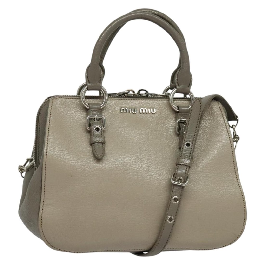 Miu Miu Gray Silver Leather 2way Hand Bag Auth 138547: Miu Miu Gray Silver Leather 2way Hand Bag Auth 138547 This Miu Miu handbag is a stylish accessory crafted from high-quality leather in a sophisticated gray and silver color combination. The bag featur