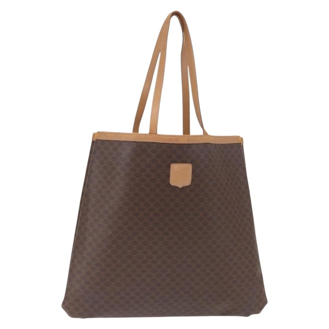 Macadam Canvas Brown Tote by Celine with PVC Leather Accents: Macadam Canvas Brown Tote by Celine with PVC Leather Accents This CELINE Macadam tote bag features a brown and gold PVC leather exterior with the signature Macadam canvas pattern. The bag is made in I