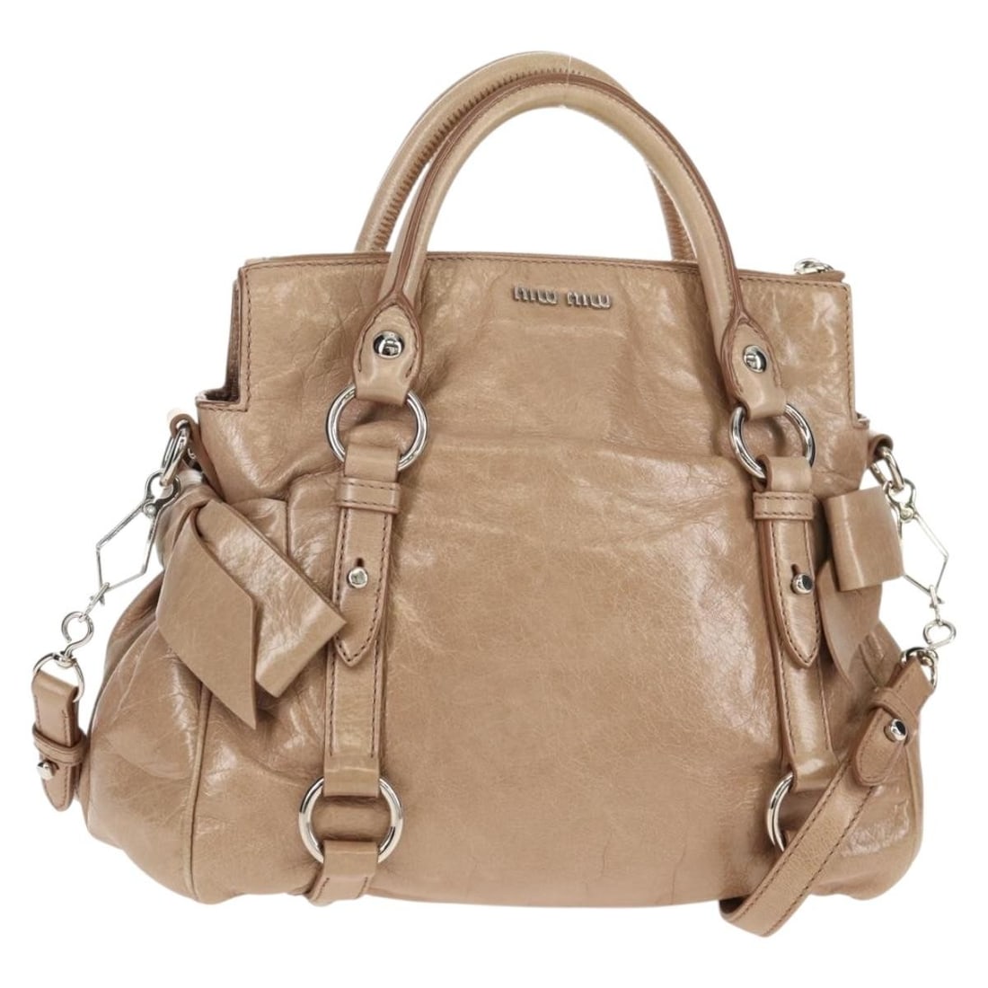Miu Miu Beige Silver Leather Hand Bag with Shoulder Strap Auth AM10130V: Miu Miu Beige Silver Leather Hand Bag with Shoulder Strap Auth AM10130V This Miu Miu Hand Bag is crafted from high-quality leather and features a stylish beige and silver color combination. Designed f